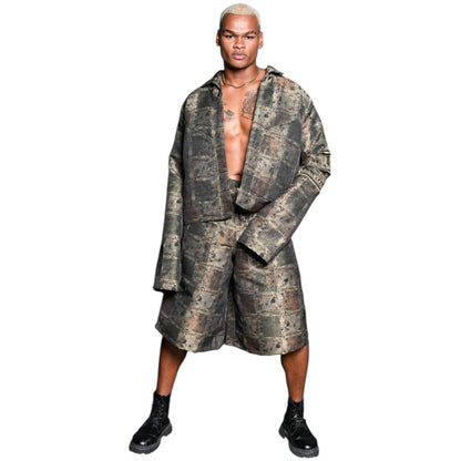 Man wearing a camouflage outfit on a white background